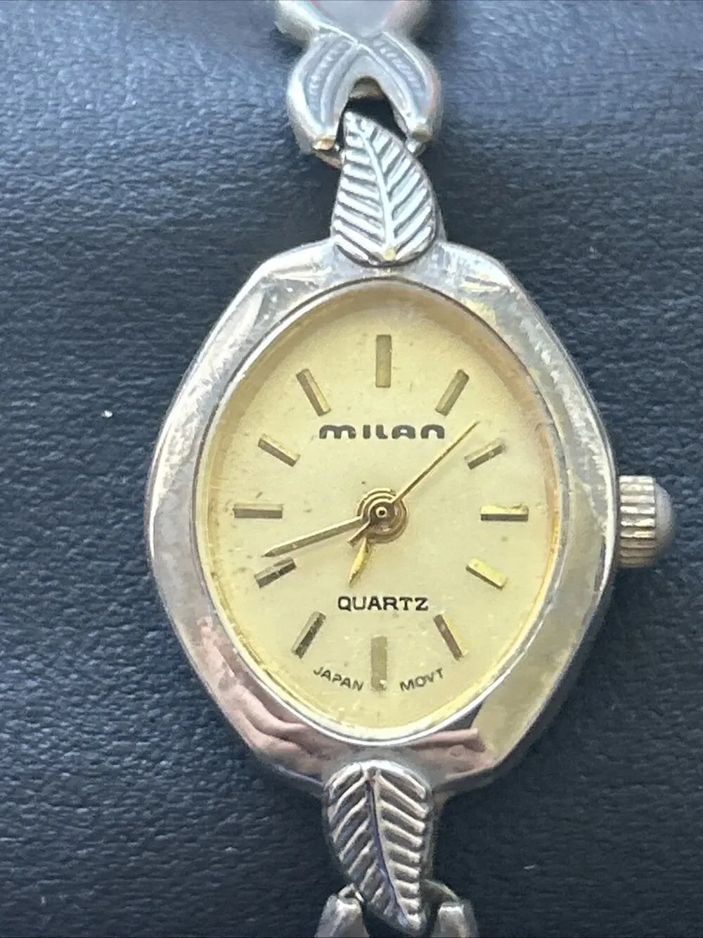 Milan Silver Tone Case Gold Tone Dial Women’s Stretch Band Quartz Watch